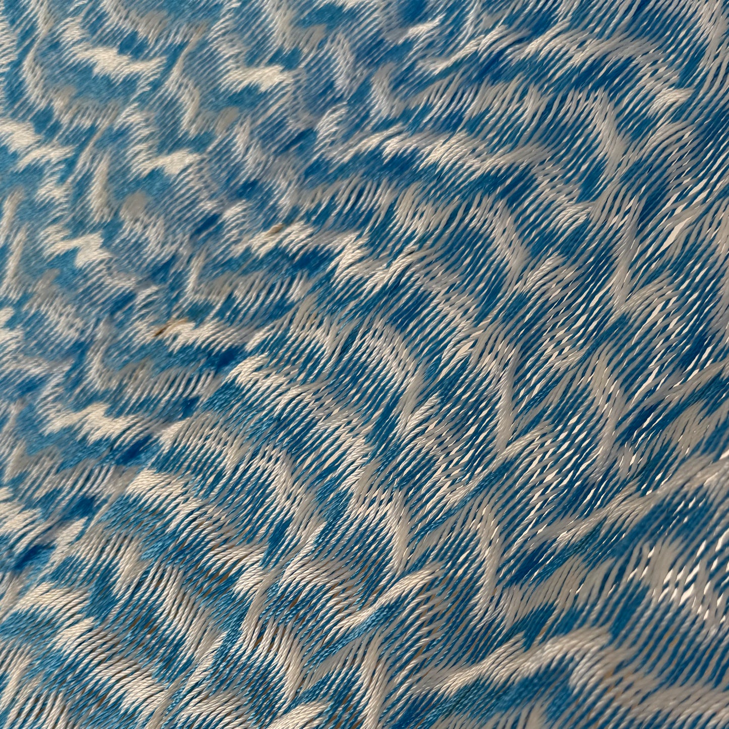 Detalle del tejido de nylon de la hamaca artesanal Yucateca azul y blanco