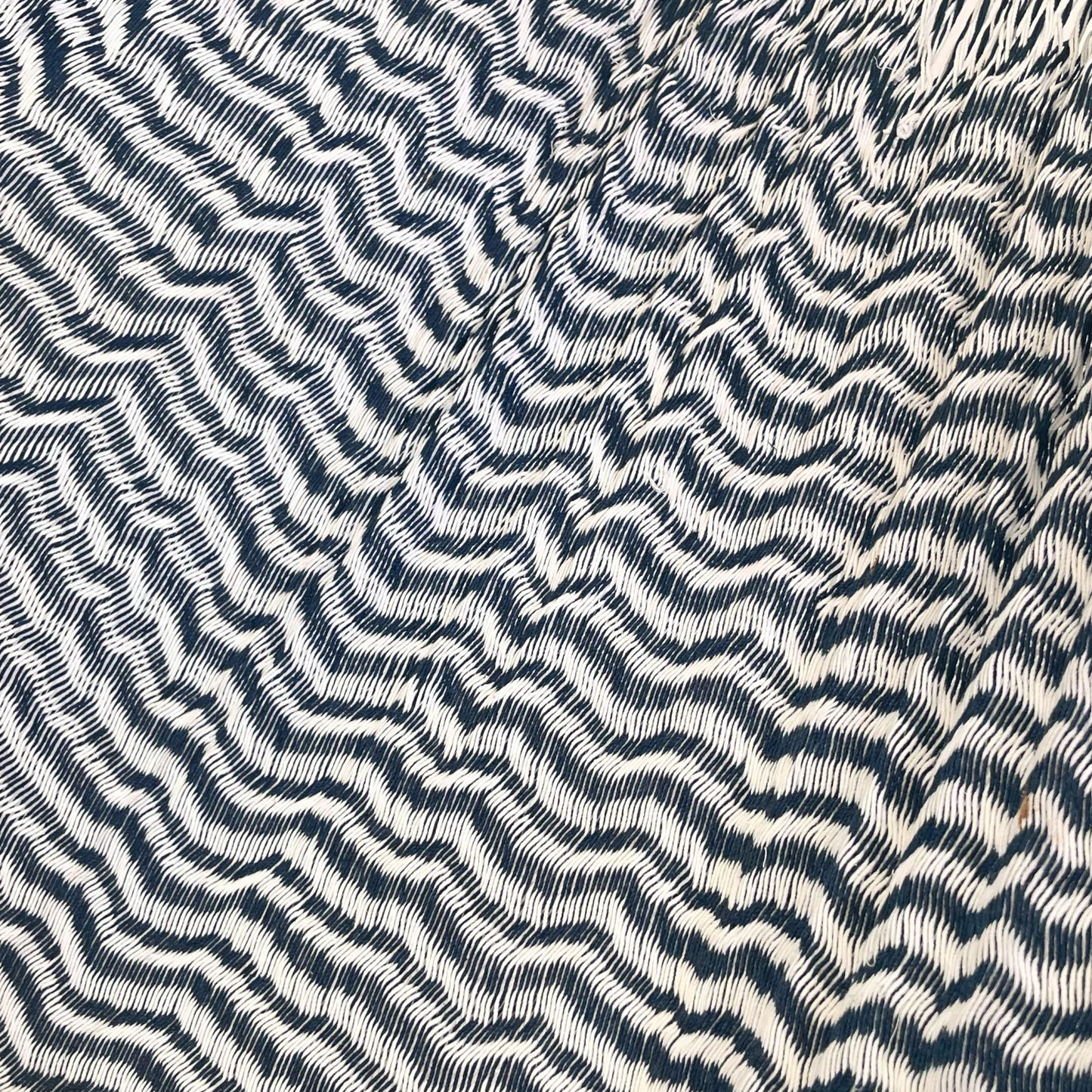 Detalle del tejido de algodón suave de la hamaca Yucateca artesanal azul y blanco