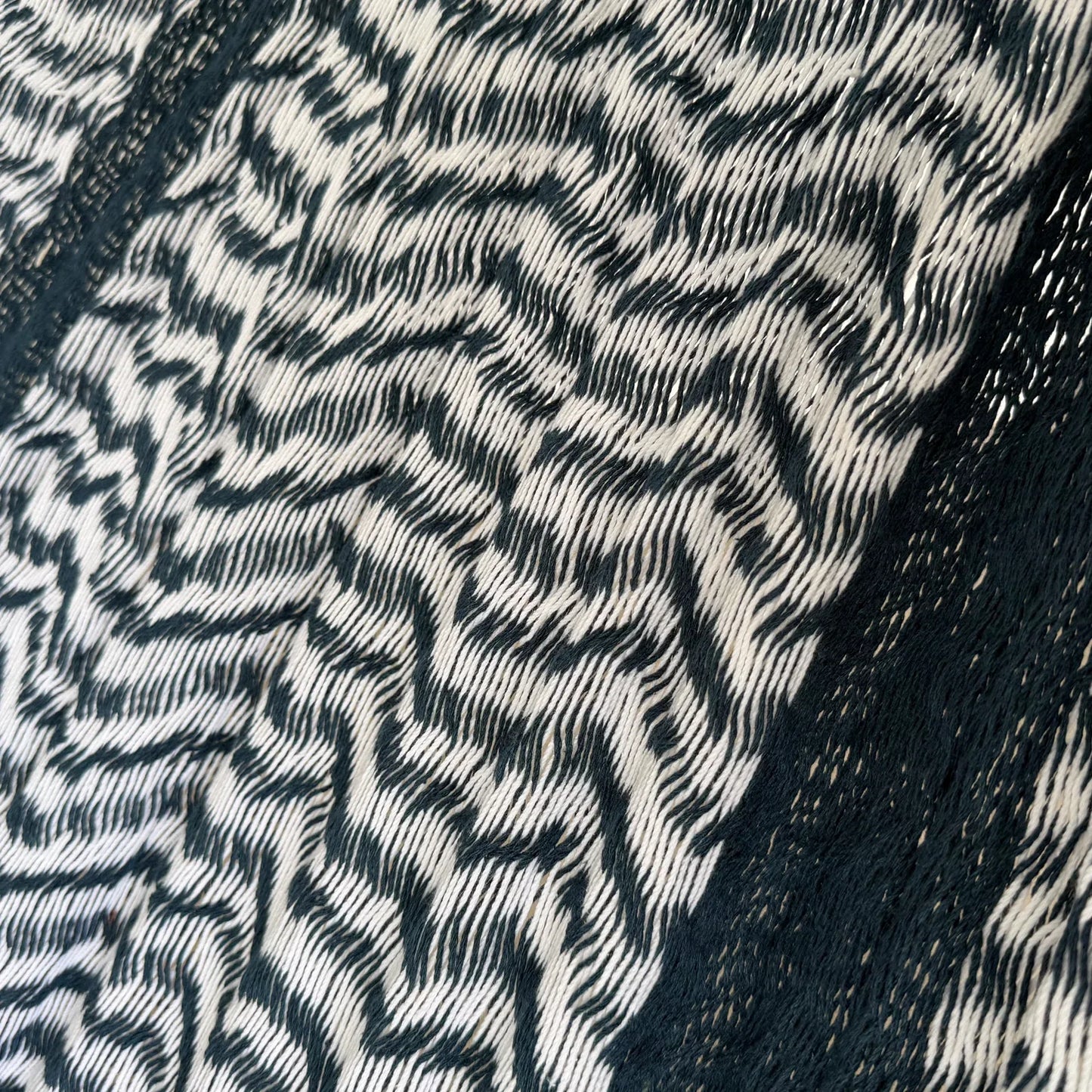 Detalle del tejido de algodón suave de la hamaca Yucateca artesanal azul y blanco