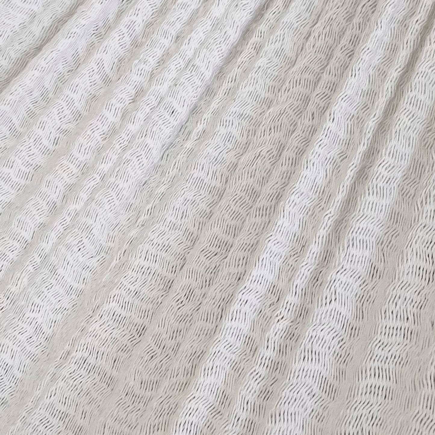 Detalle del tejido de algodón suave de la hamaca Yucateca artesanal blanca