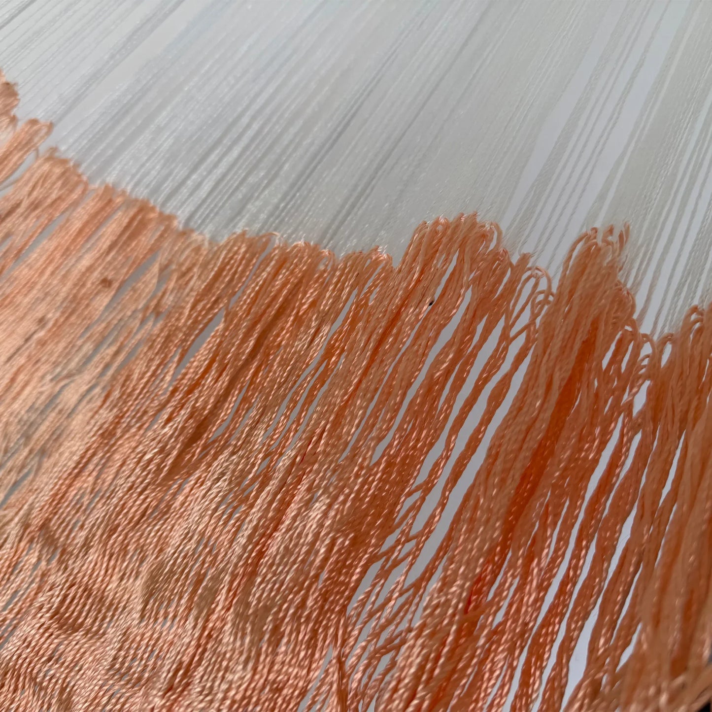 Unión entre el cuerpo y el brazo de hamaca Yucateca artesanal de nylon coral