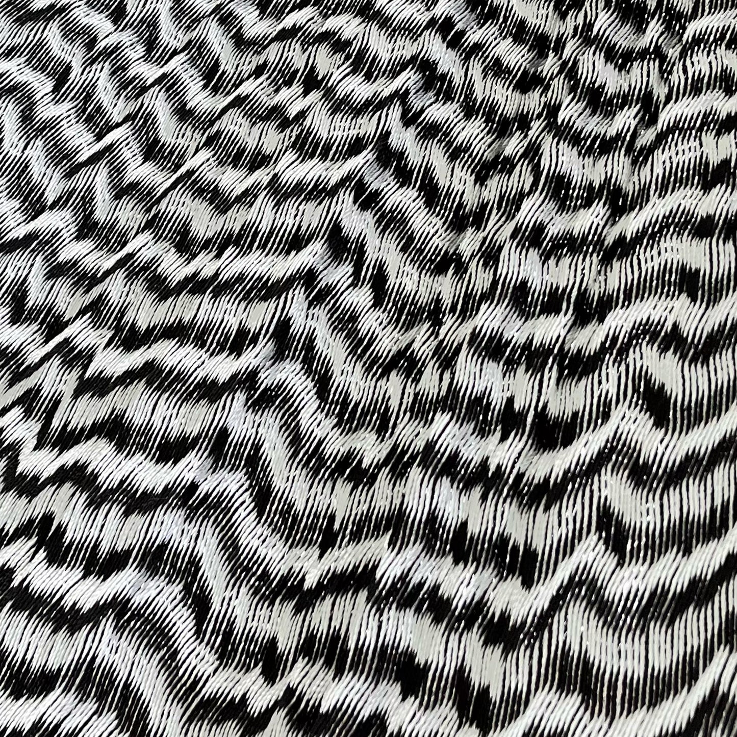 Detalle del tejido de nylon hilo 18 de la hamaca Yucateca artesanal plateado y negro