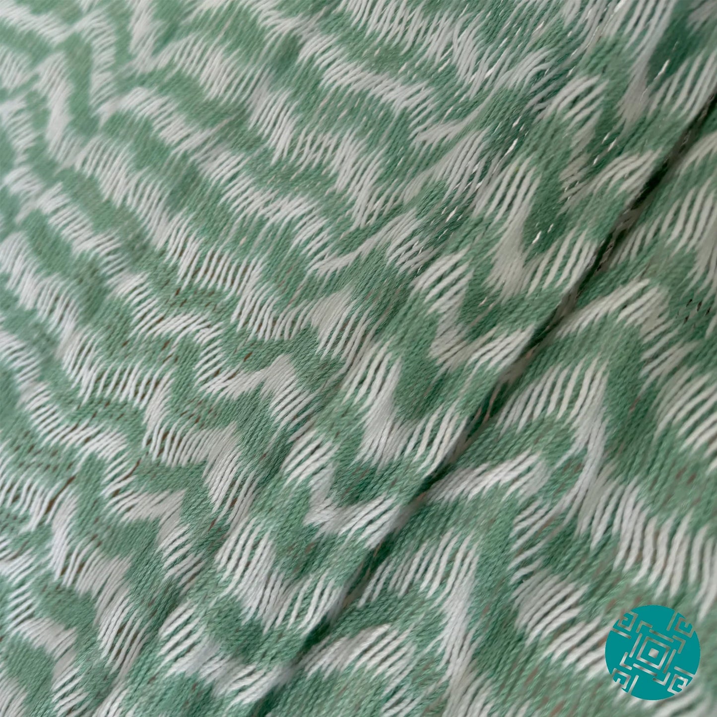 Detalle del tejido de algodón suave de la hamaca Yucateca artesanal color menta