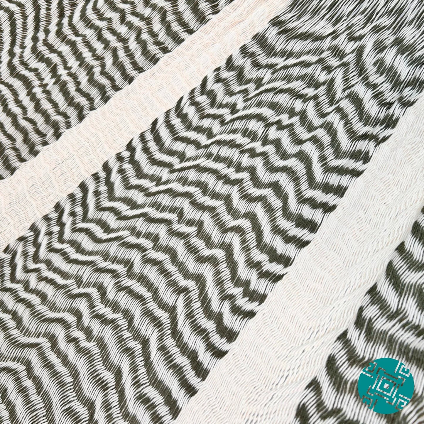 Detalle del tejido de algodón suave de la hamaca Yucateca artesanal verde y beige