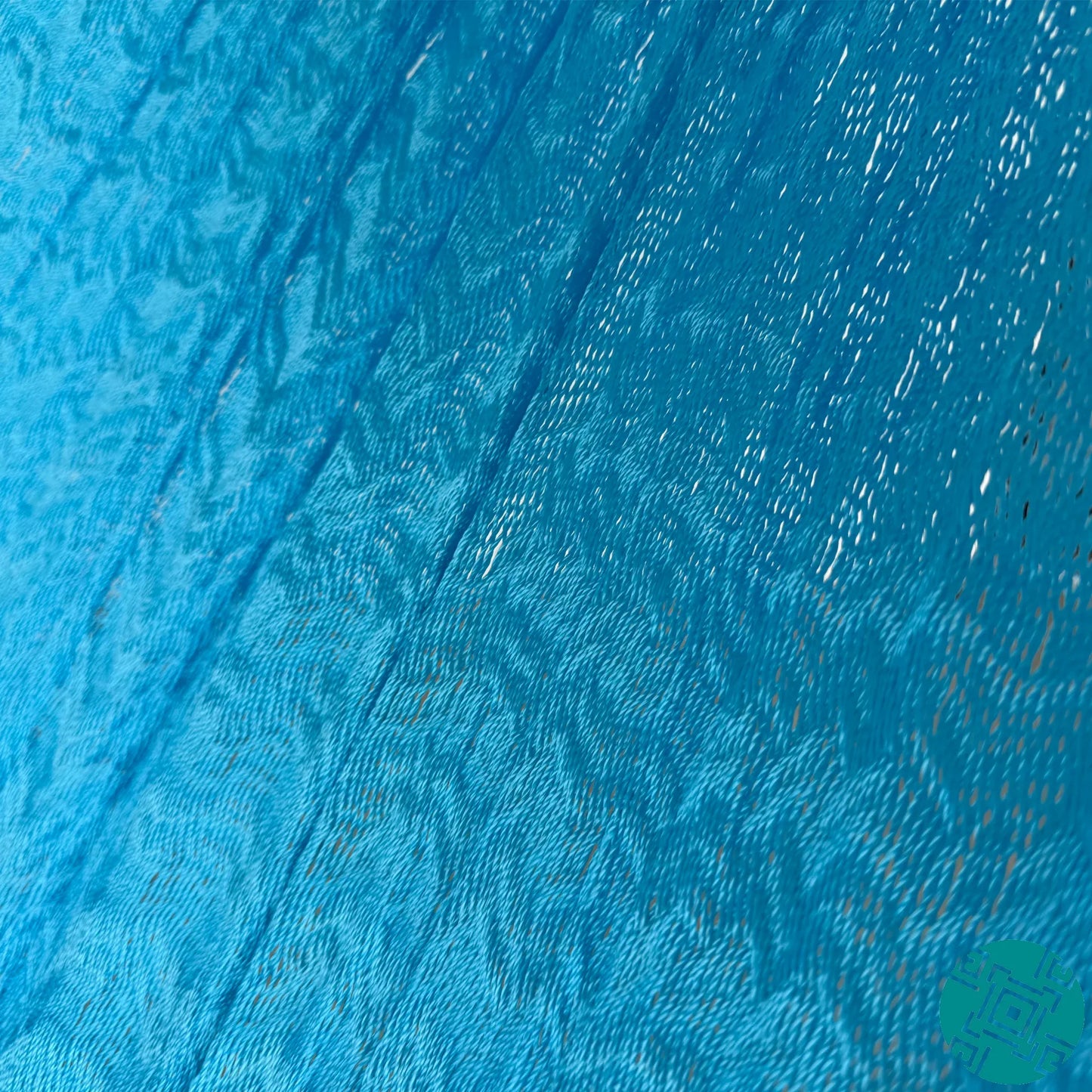 Detalle del tejido de nylon de hamaca artesanal Yucateca color azul claro