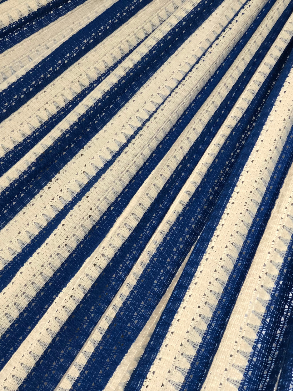 Detalle del tejido de hamaca mexicana azul y beige de algodón