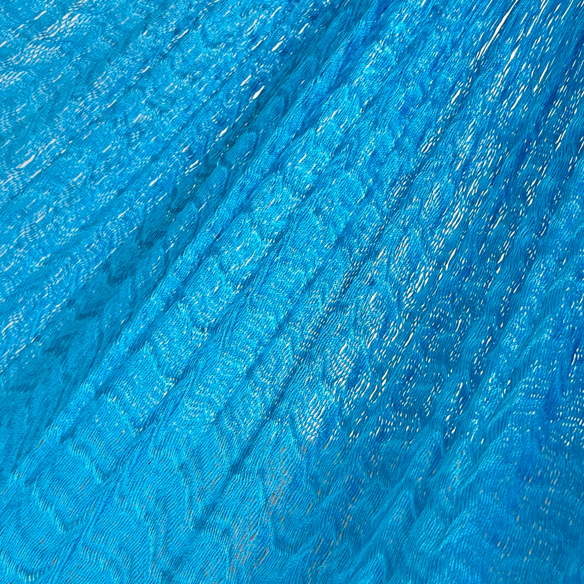 Detalle del tejido de nylon de la hamaca artesanal Yucateca azul claro
