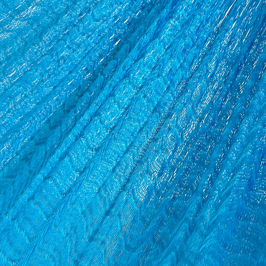 Detalle del tejido de nylon de la hamaca artesanal Yucateca azul claro
