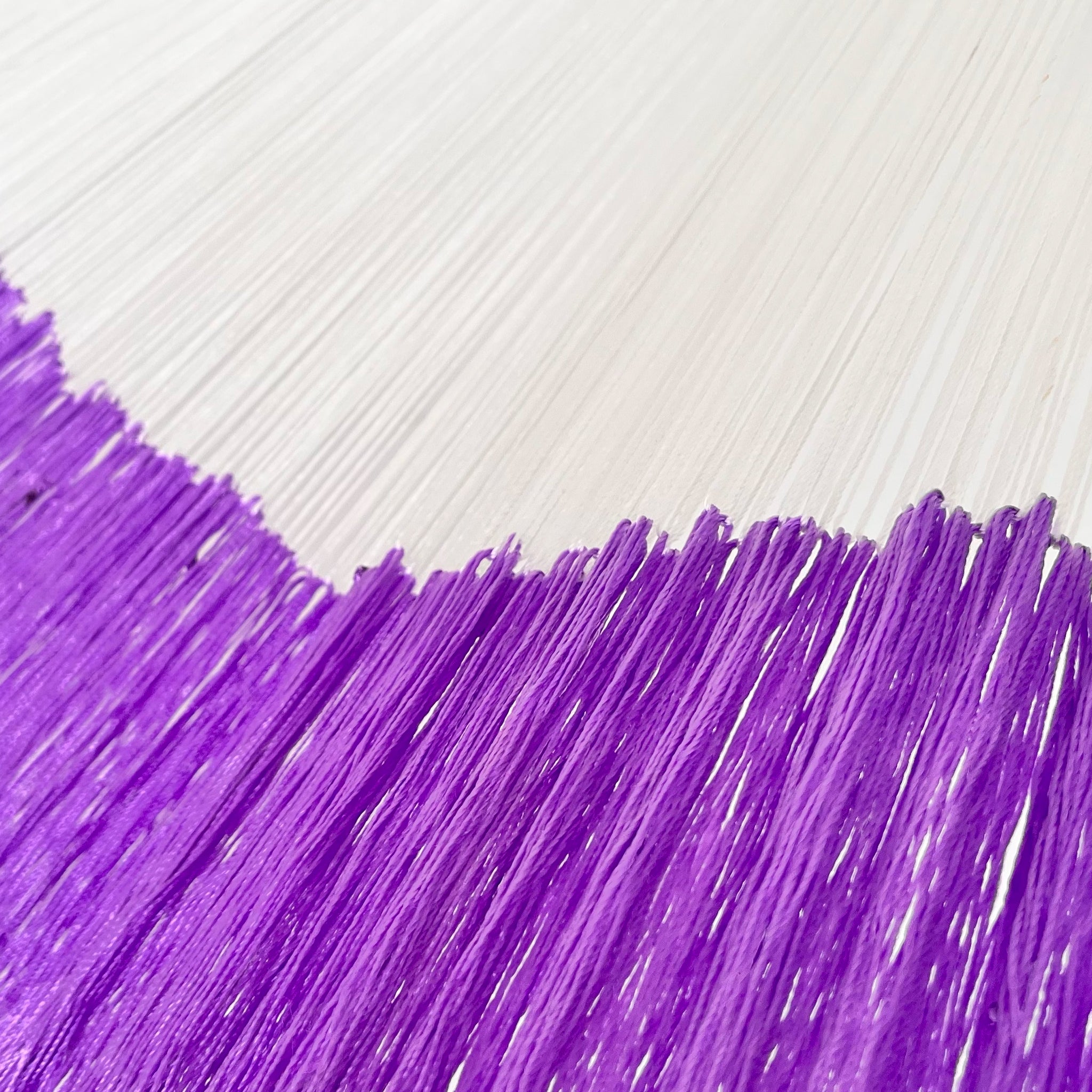 Unión entre cuerpo y brazo de hamaca artesanal Yucateca de nylon color morado