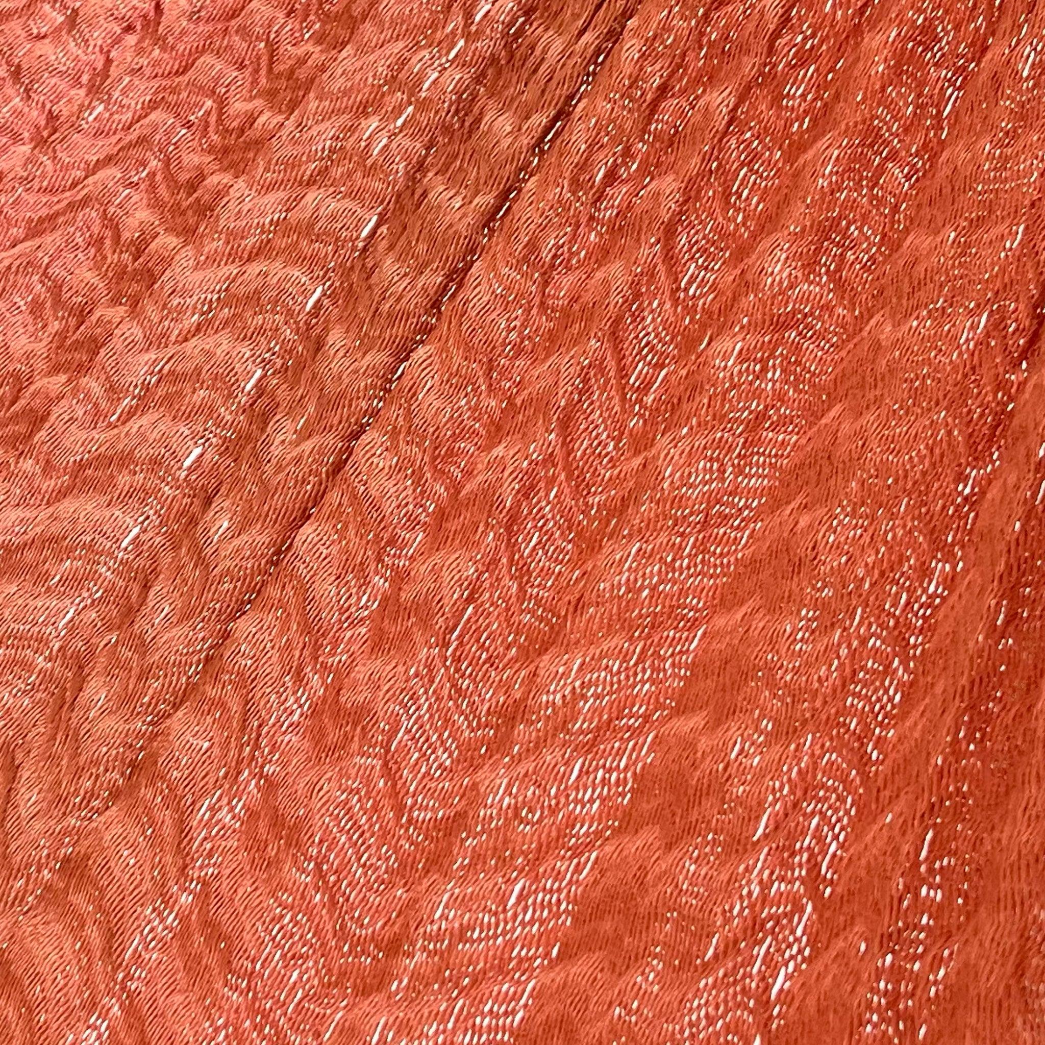 Detalle del tejido de nylon de la hamaca artesanal Yucateca naranja