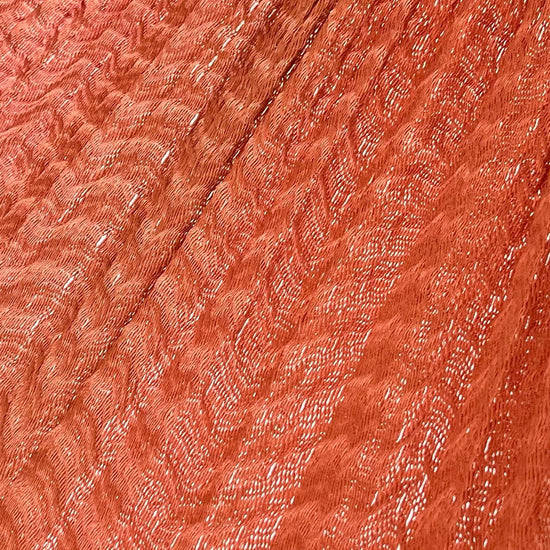 Detalle del tejido de nylon de la hamaca artesanal Yucateca naranja