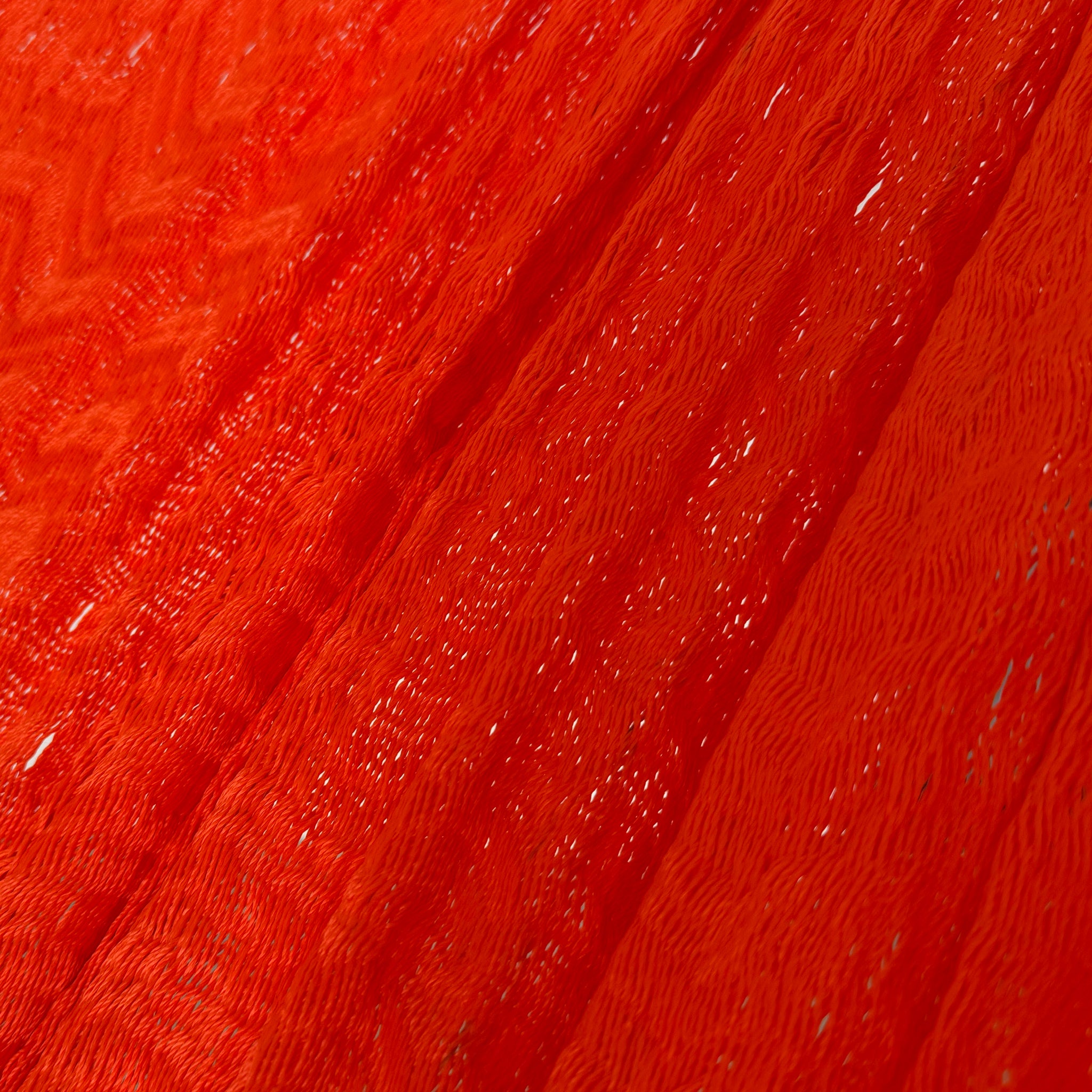 Detalle del tejido de nylon de la hamaca artesanal Yucateca rojo