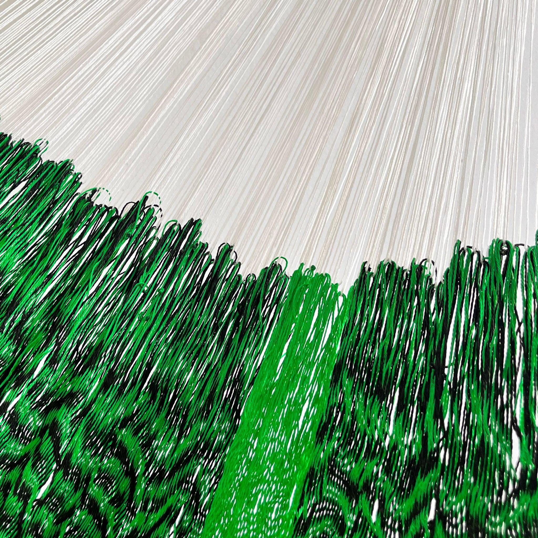 Unión entre cuerpo y brazo de hamaca artesanal Yucateca de nylon color verde y negro