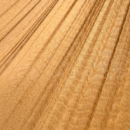 Detalle del tejido de algodón suave de la hamaca Yucateca artesanal amarillo pastel