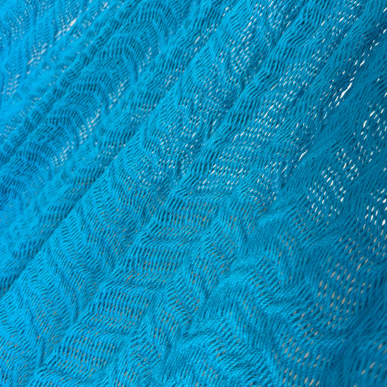 Detalle del tejido de algodón suave de hamaca Yucateca artesanal azul