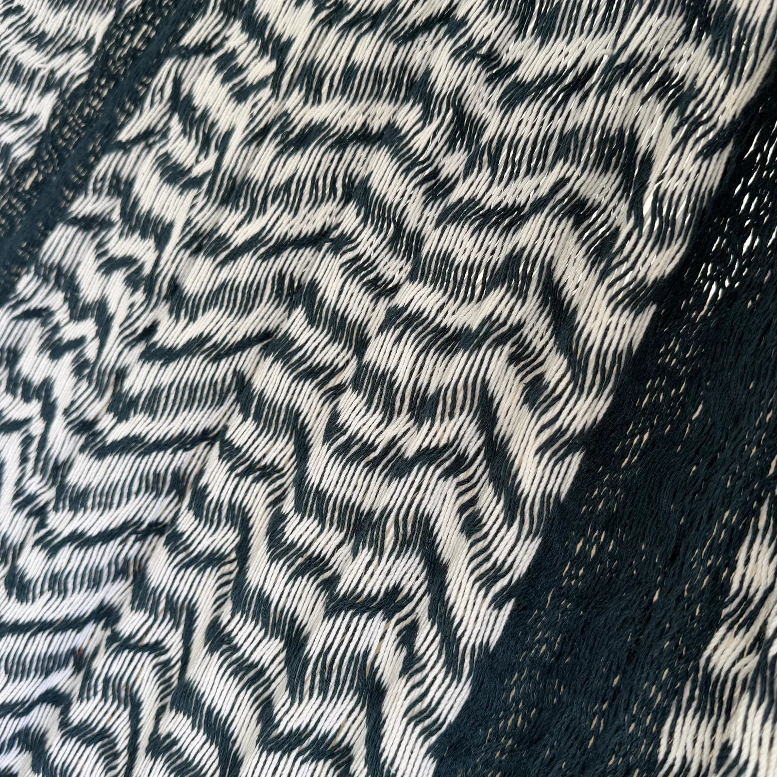 Detalle del tejido de algodón suave de la hamaca Yucateca artesanal azul y blanco