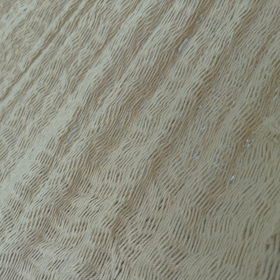 Detalle del tejido de algodón suave de la hamaca Yucateca artesanal beige