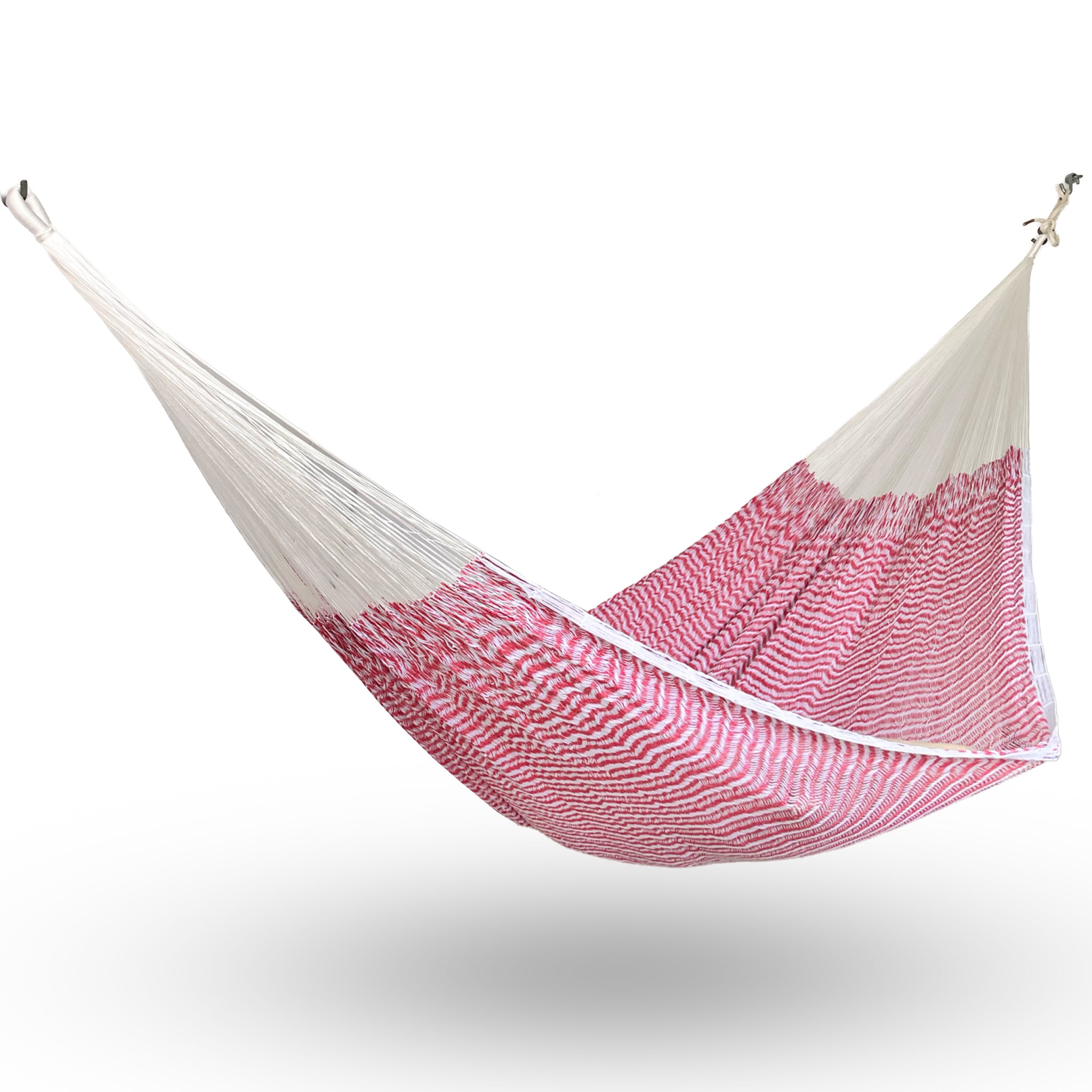 Hamaca Yucateca artesanal de algodón suave color blanco y rosa colgada y abierta