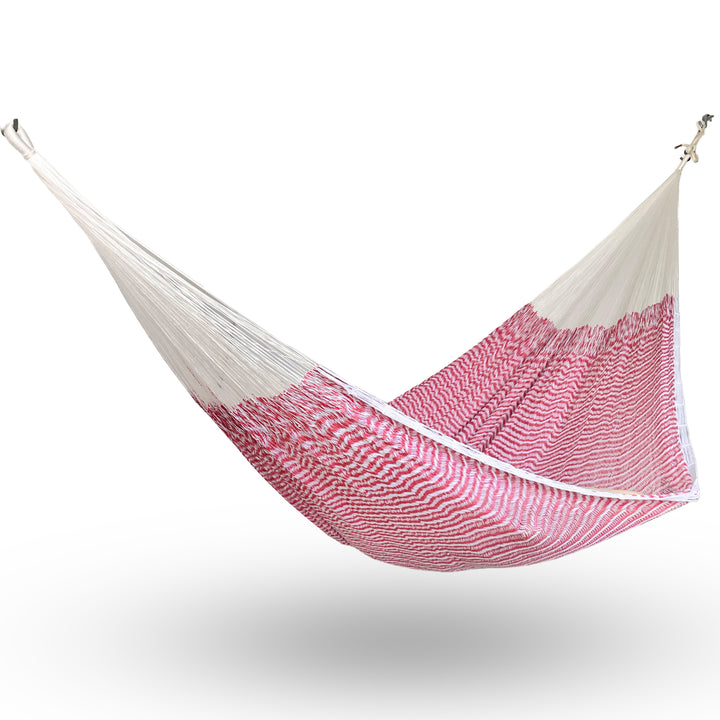 Hamaca Yucateca artesanal de algodón suave color blanco y rosa colgada y abierta