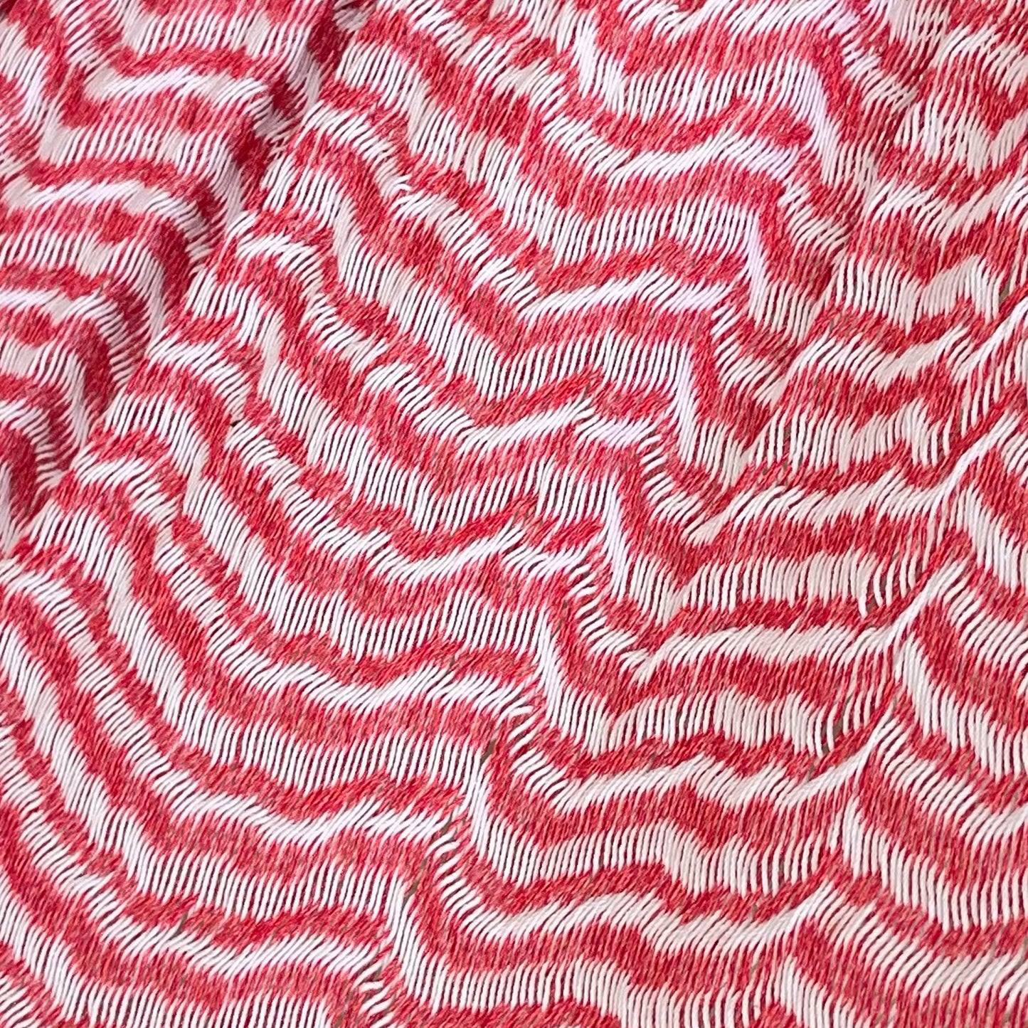 Detalle del tejido de algodón suave de la hamaca Yucateca artesanal blanco y rosa