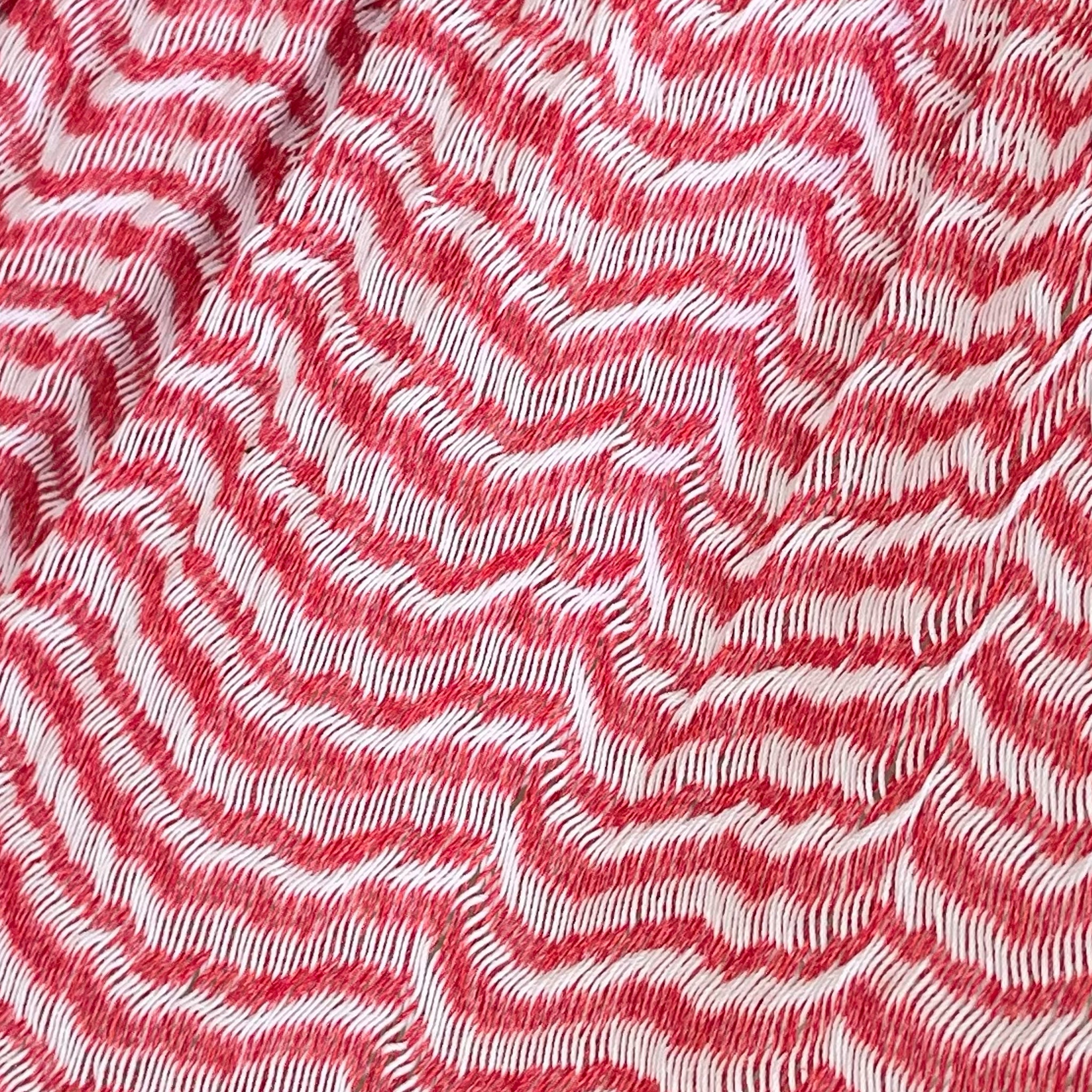 Detalle del tejido de algodón suave de la hamaca Yucateca artesanal blanco y rosa