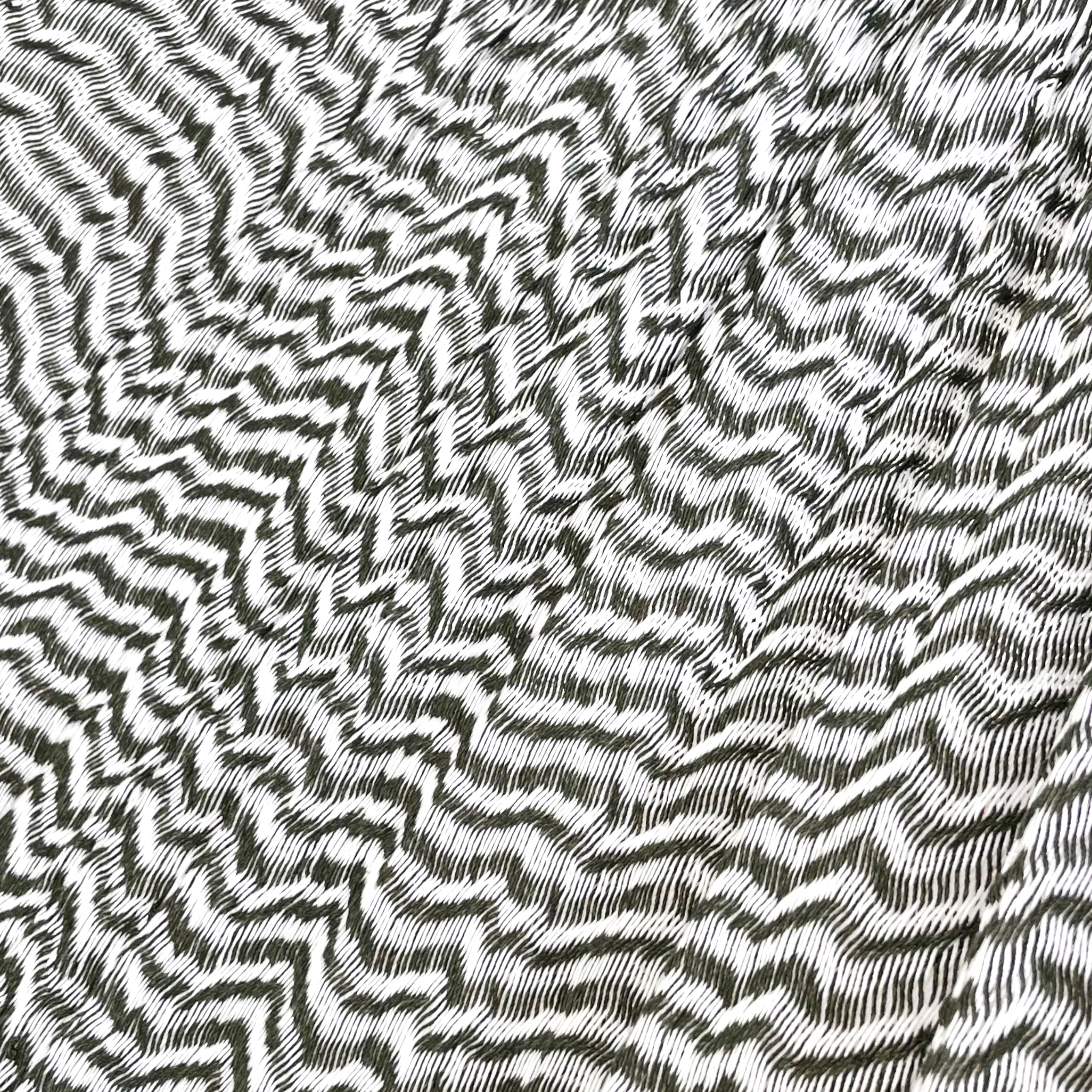 Detalle del tejido de algodón suave de la hamaca Yucateca artesanal blanco y verde