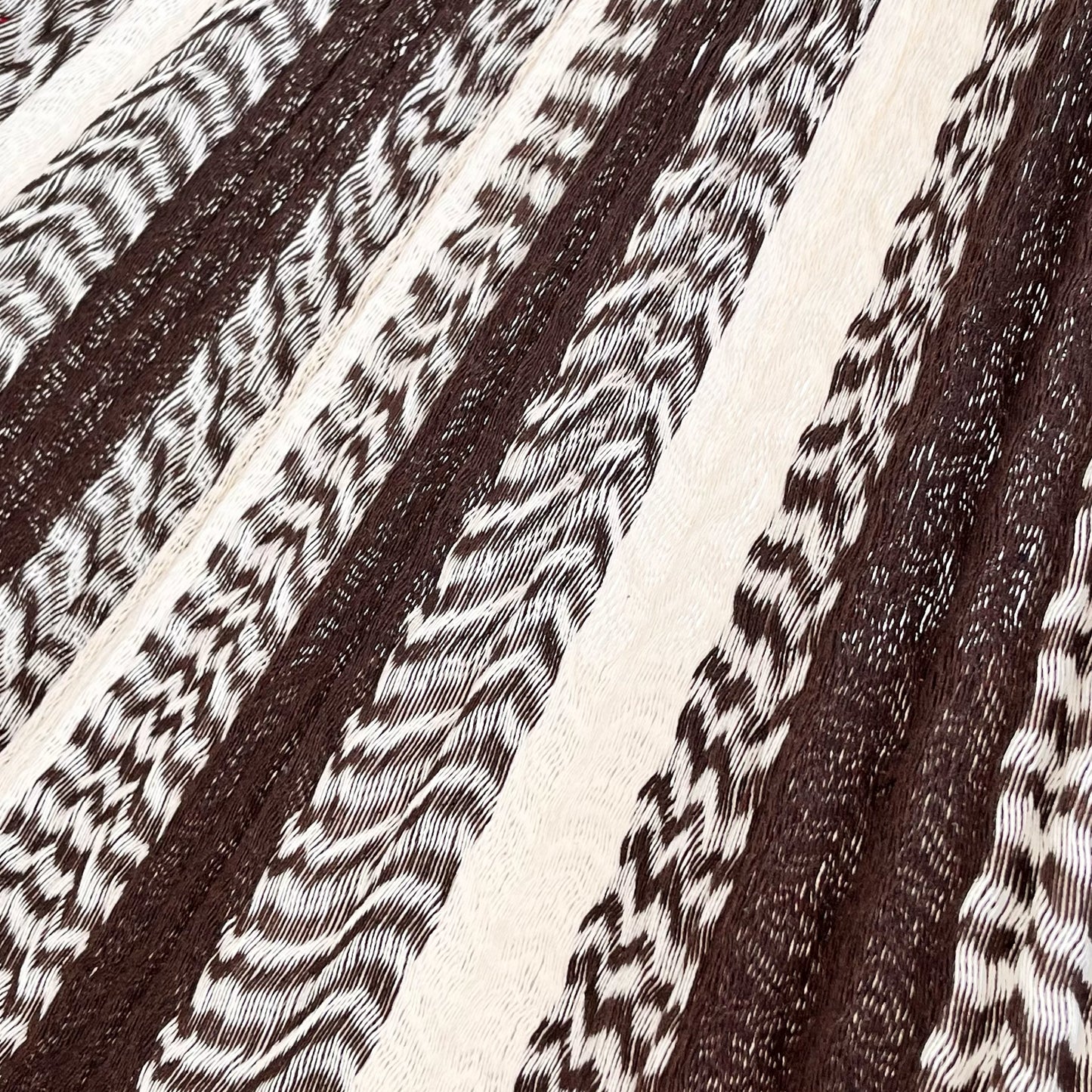 Detalle del tejido de algodón suave de la hamaca Yucateca artesanal café