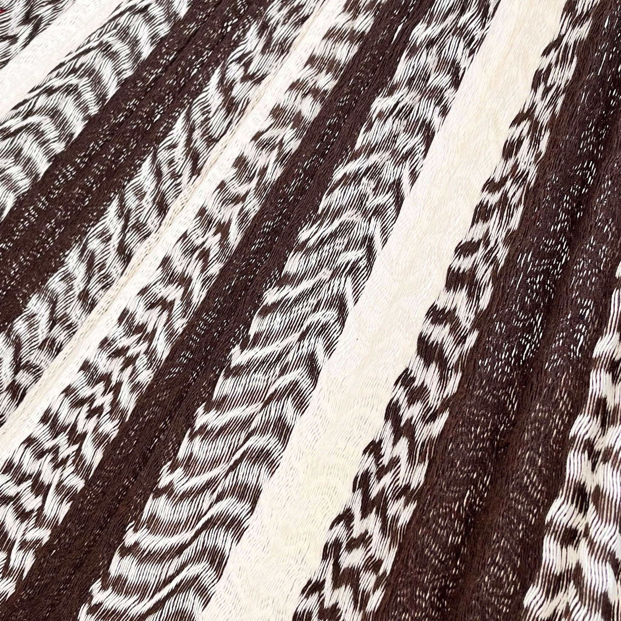 Detalle del tejido de algodón suave de la hamaca Yucateca artesanal café