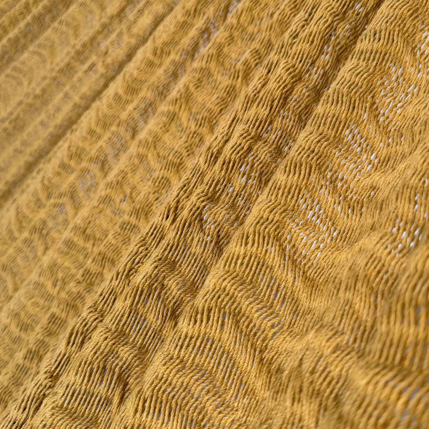 Detalle del tejido de algodón suave de hamaca Yucateca artesanal dorado