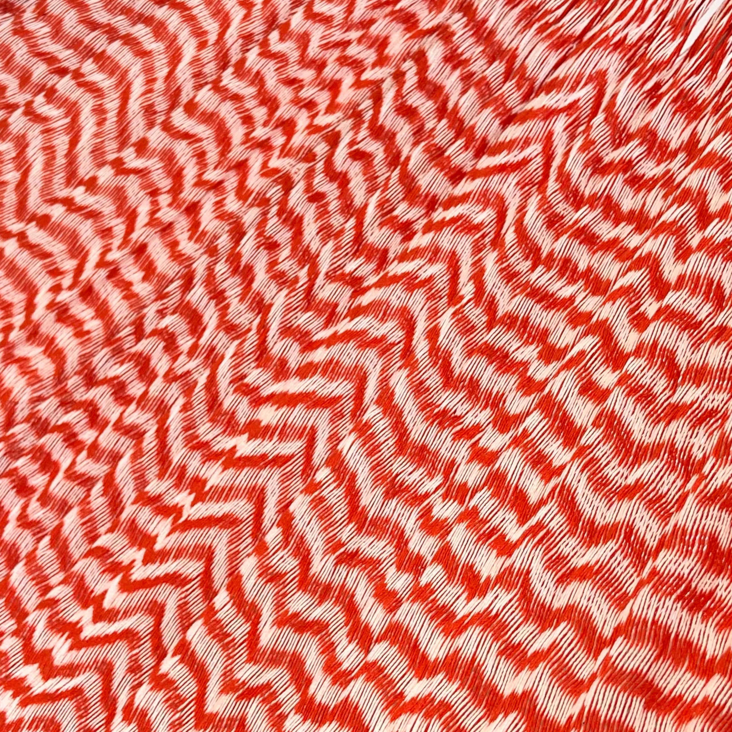 Detalle del tejido de algodón suave de la hamaca Yucateca artesanal naranja y blanco