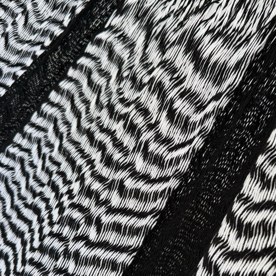 Detalle del tejido de algodón suave de la hamaca Yucateca artesanal negro y blanco