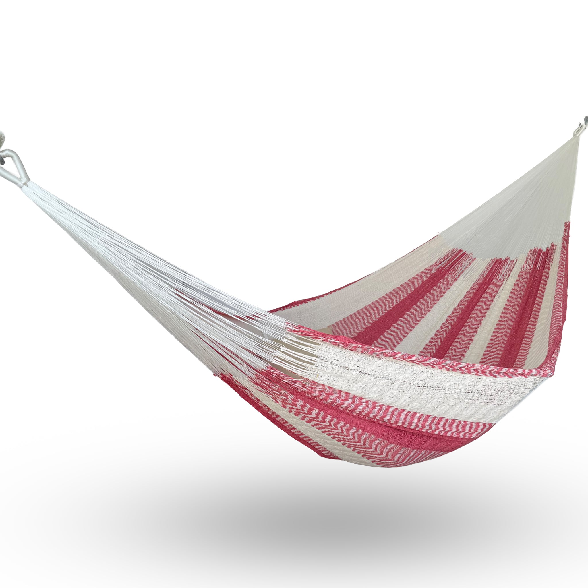 Hamaca Yucateca artesanal de algodón suave colores rosa y blanco colgada y abierta