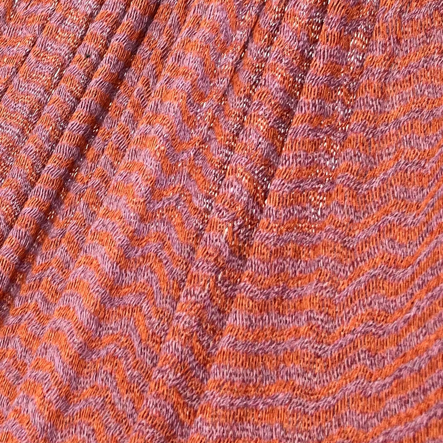 Detalle del tejido de algodón suave de la hamaca Yucateca artesanal rosa y naranja