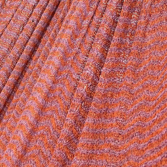 Detalle del tejido de algodón suave de la hamaca Yucateca artesanal rosa y naranja