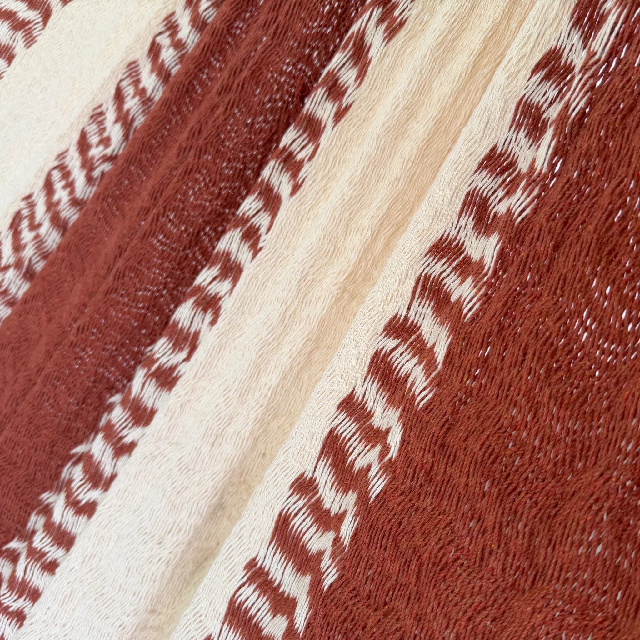 Detalle del tejido de algodón suave de la hamaca Yucateca artesanal terracota y beige