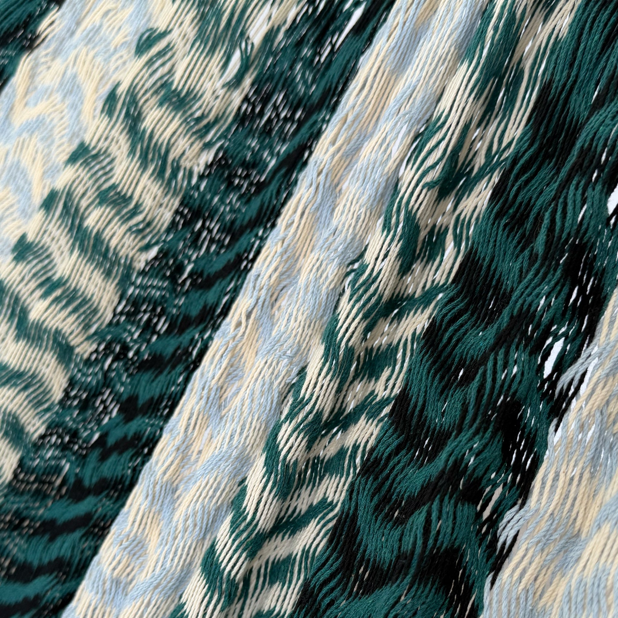 Detalle del tejido de algodón suave de la hamaca Yucateca artesanal verde