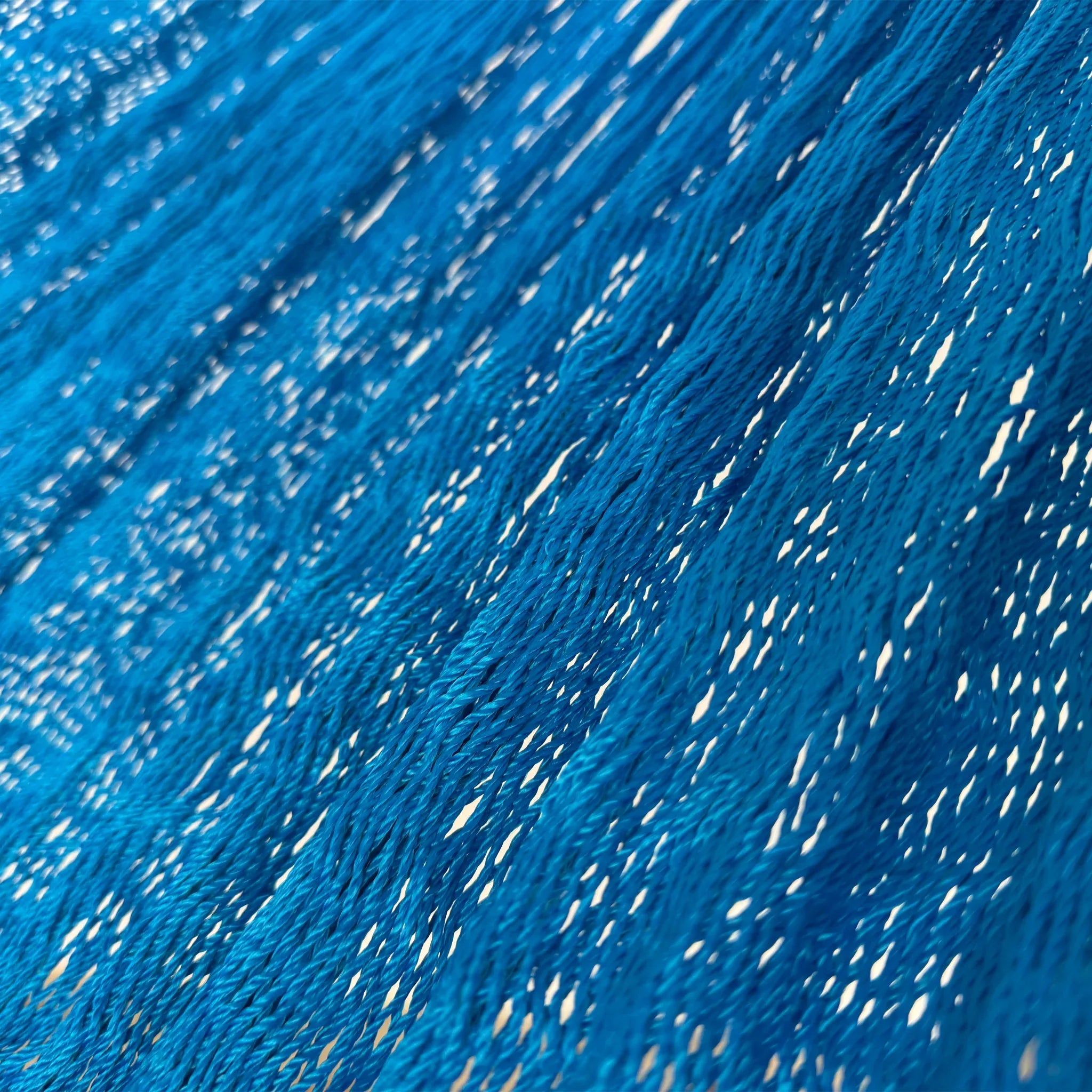 Detalle del tejido de hilo 18 de nylon de hamaca Yucateca artesanal azul rey