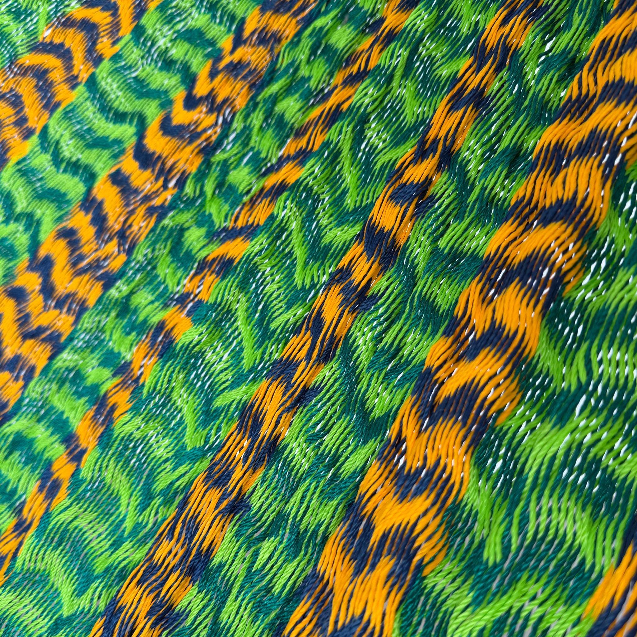 Detalle del tejido de hilo 18 de nylon de hamaca Yucateca artesanal verde y naranja