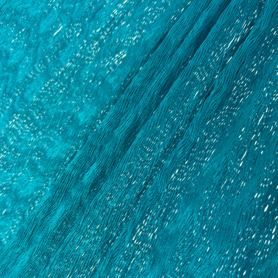 Detalle del tejido de nylon de hamaca Yucateca artesanal azul petróleo