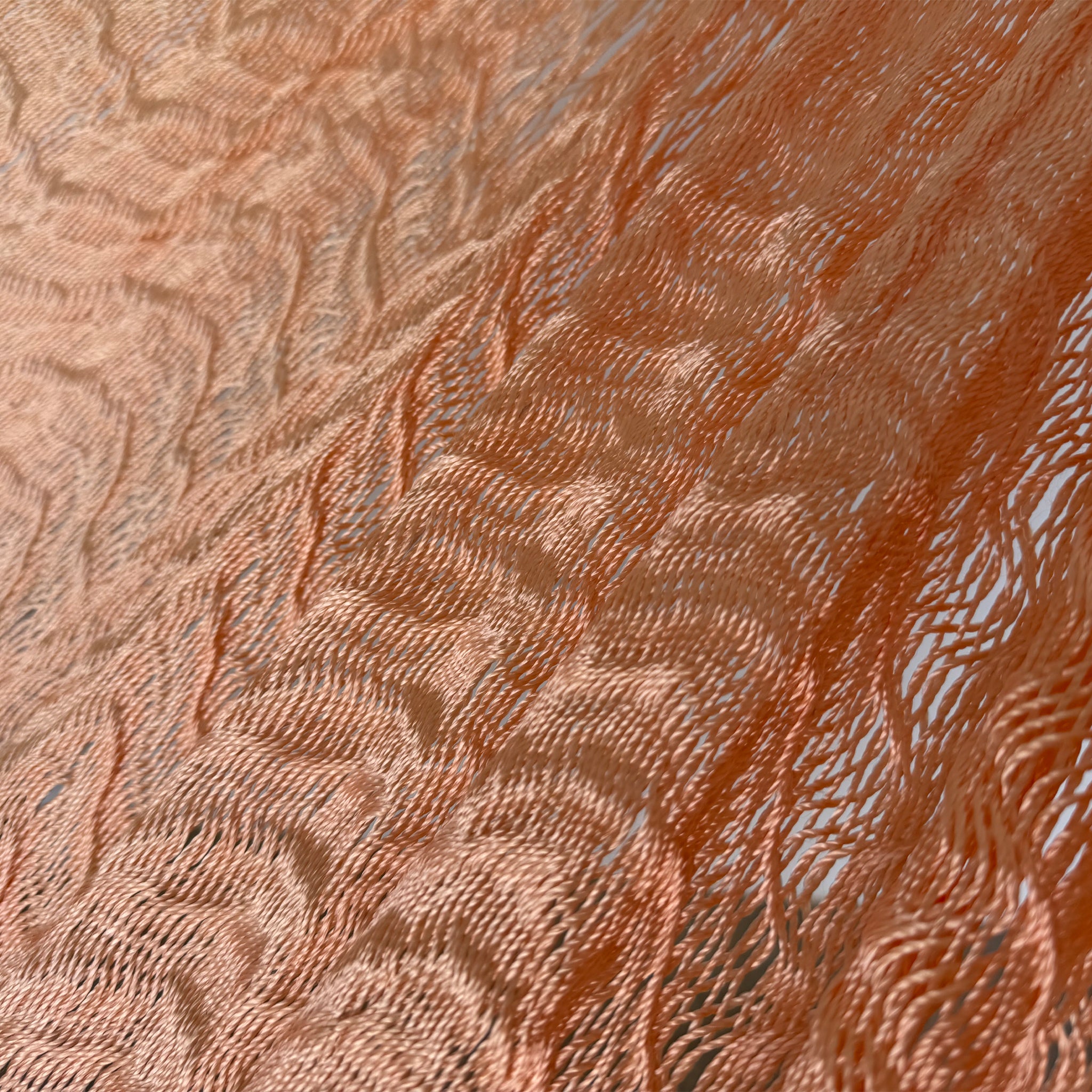 Detalle del tejido de nylon de hamaca Yucateca artesanal coral