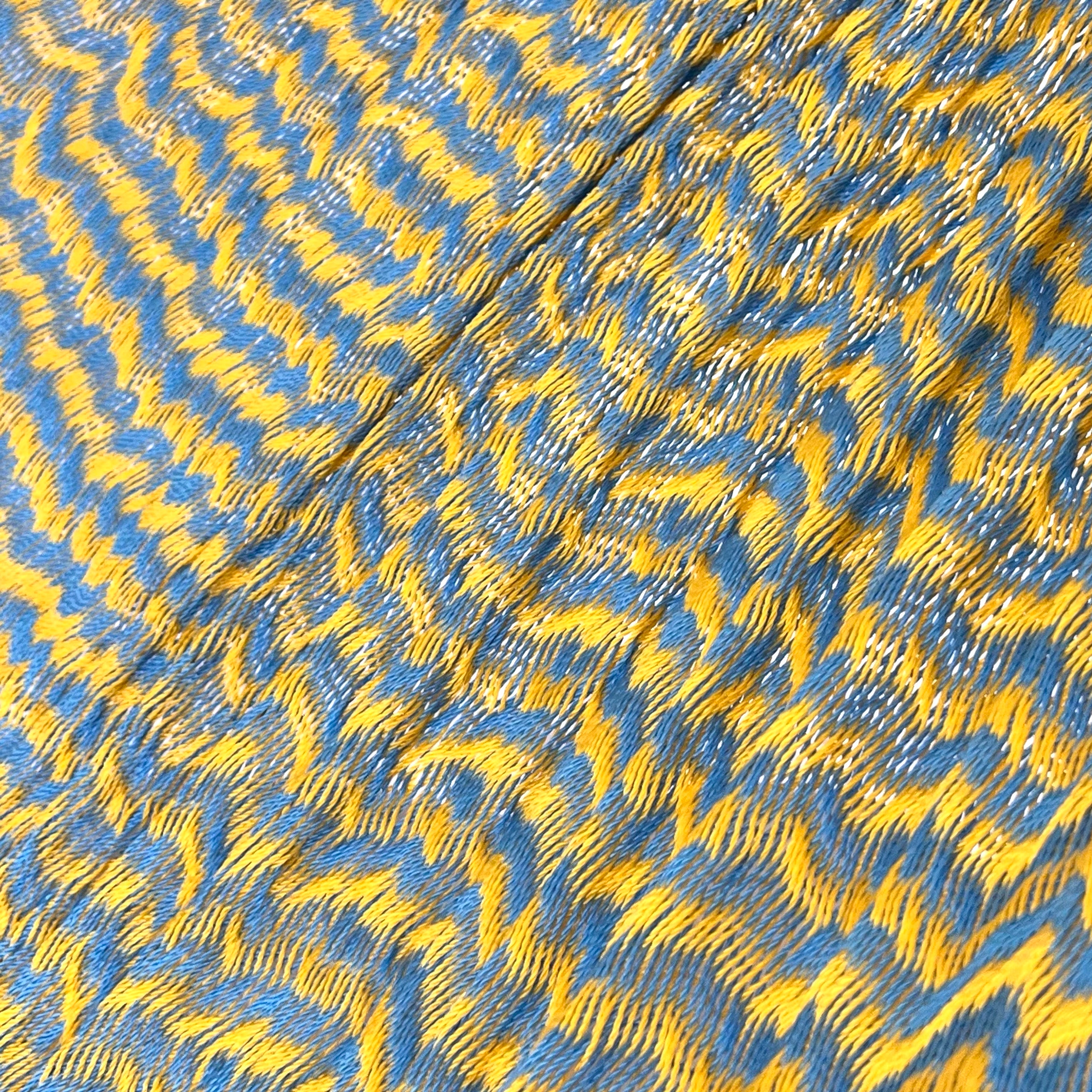 Detalle del tejido de nylon hilo 18 de la hamaca Yucateca artesanal amarillo y azul