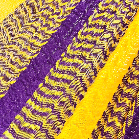 Detalle del tejido de nylon hilo 18 de la hamaca Yucateca artesanal amarillo y morado