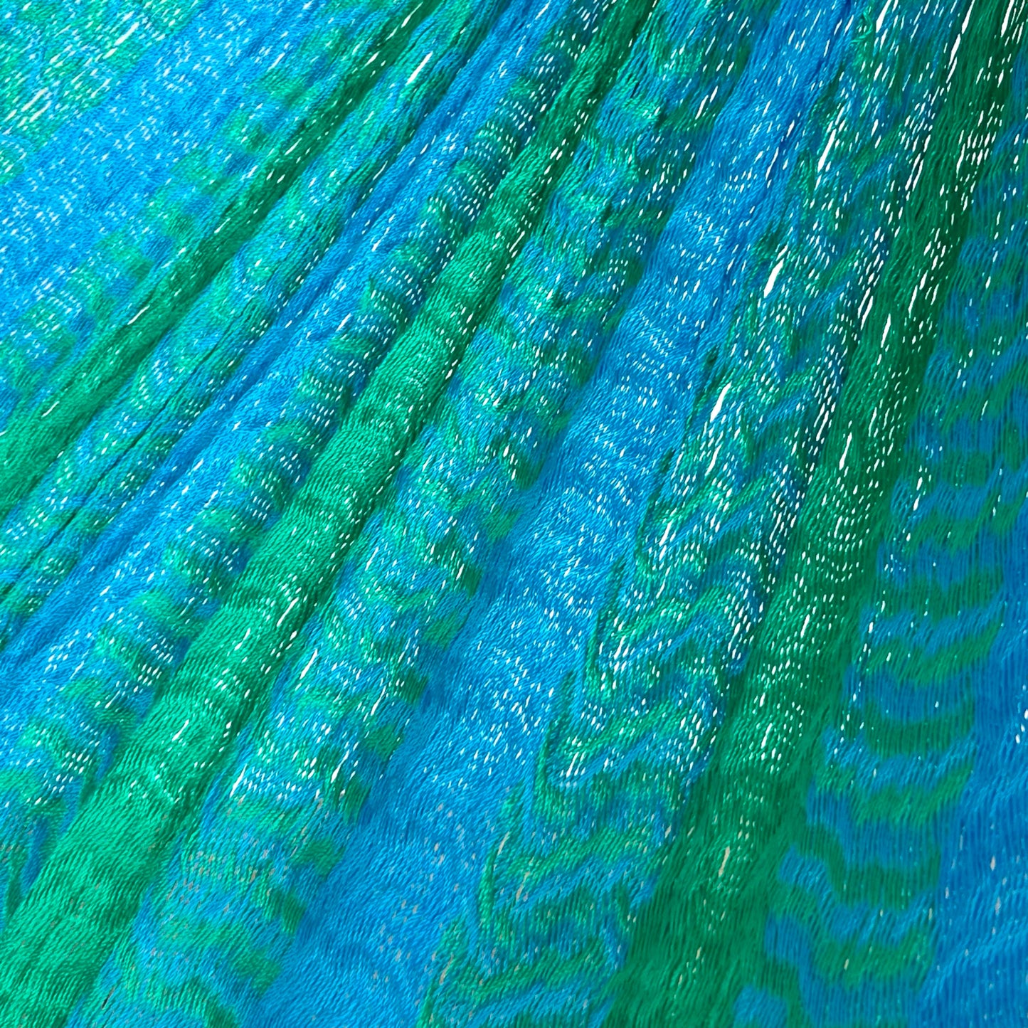 Detalle del tejido de nylon hilo 18 de la hamaca Yucateca artesanal azul claro y verde