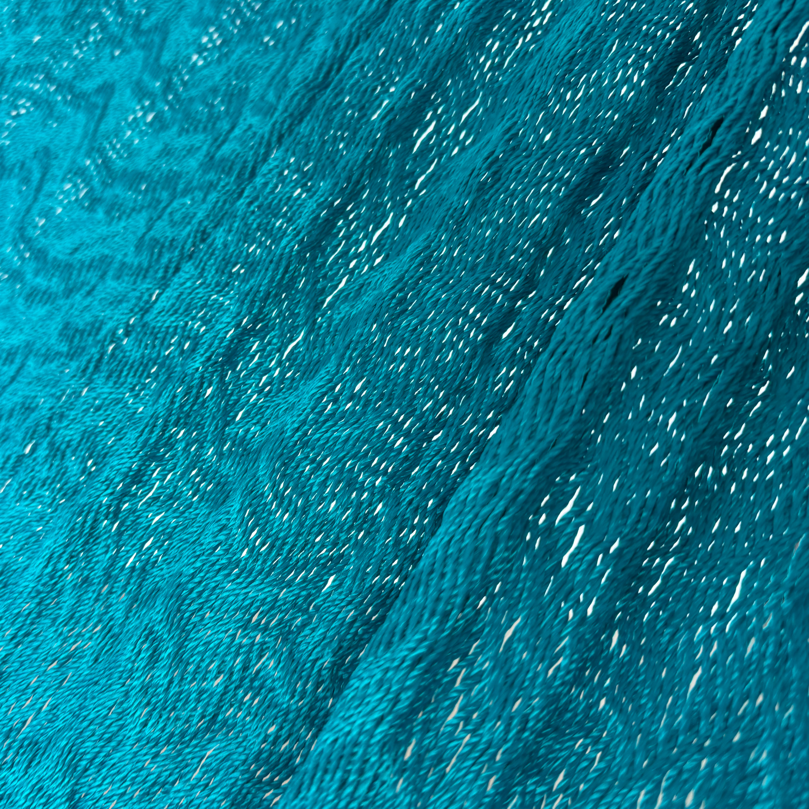 Detalle del tejido de nylon hilo 18 de la hamaca Yucateca artesanal azul petróleo