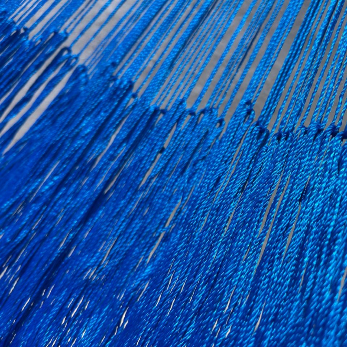 Unión entre cuerpo y brazo de hamaca Yucateca artesanal de nylon hilo 18 color azul