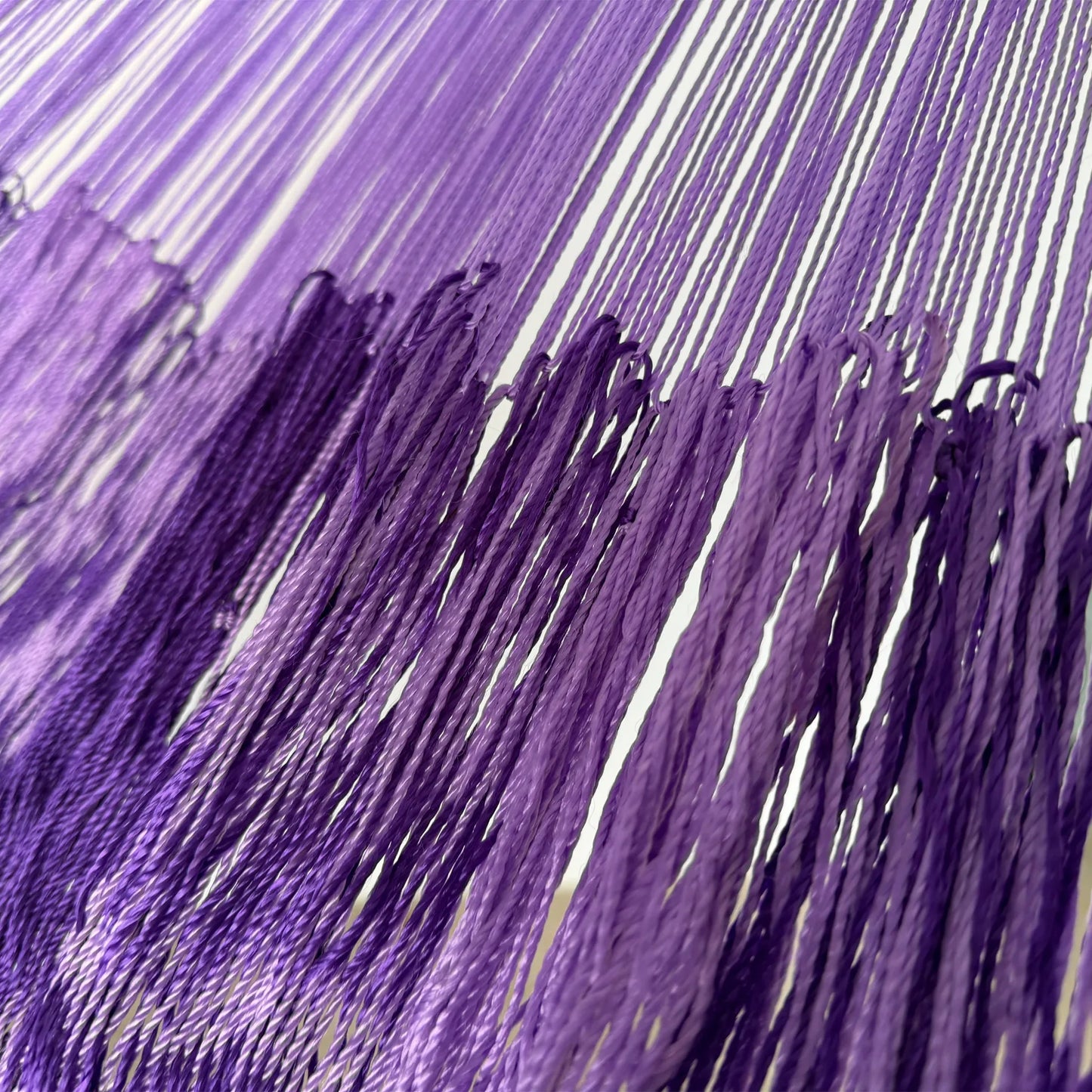 Unión entre cuerpo y brazo de hamaca Yucateca artesanal de nylon hilo 18 color morado