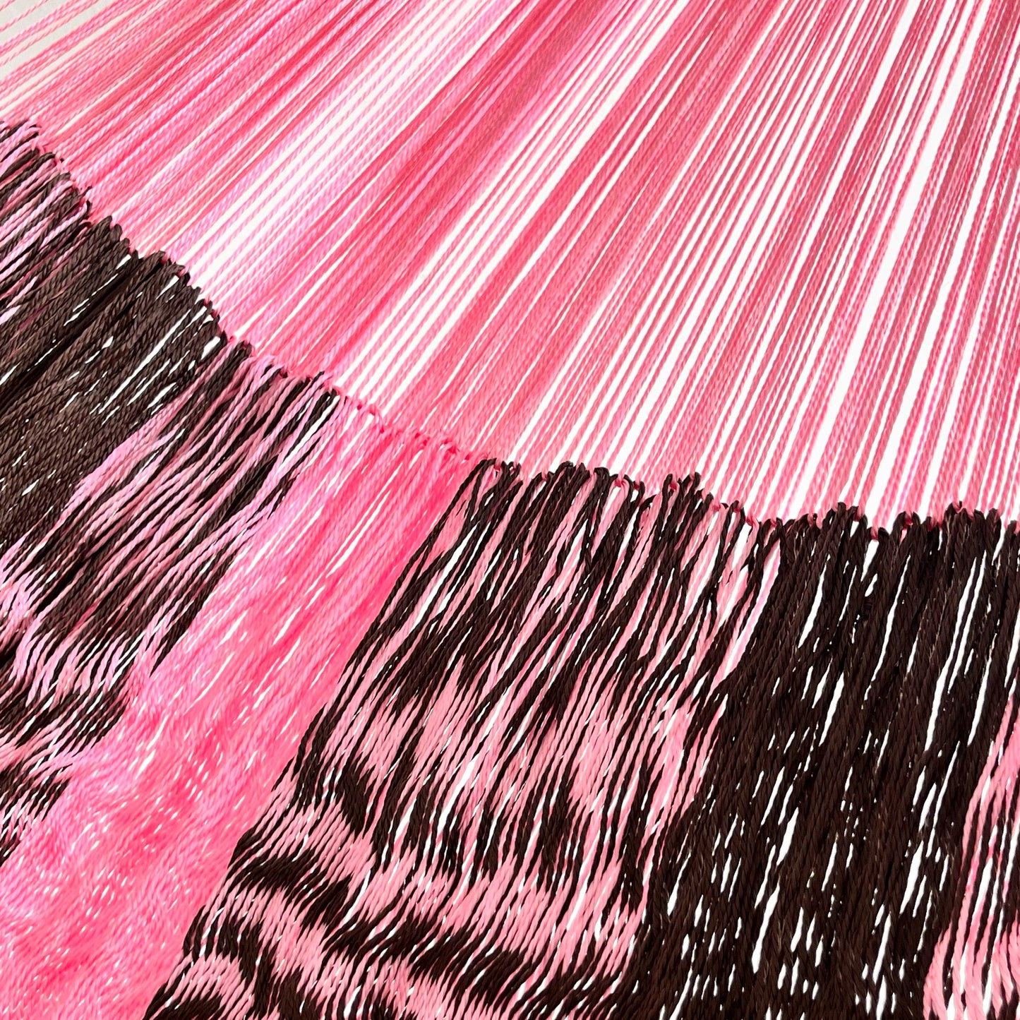 Unión entre cuerpo y brazo de hamaca Yucateca artesanal de nylon hilo 18 color rosa y café oscuro