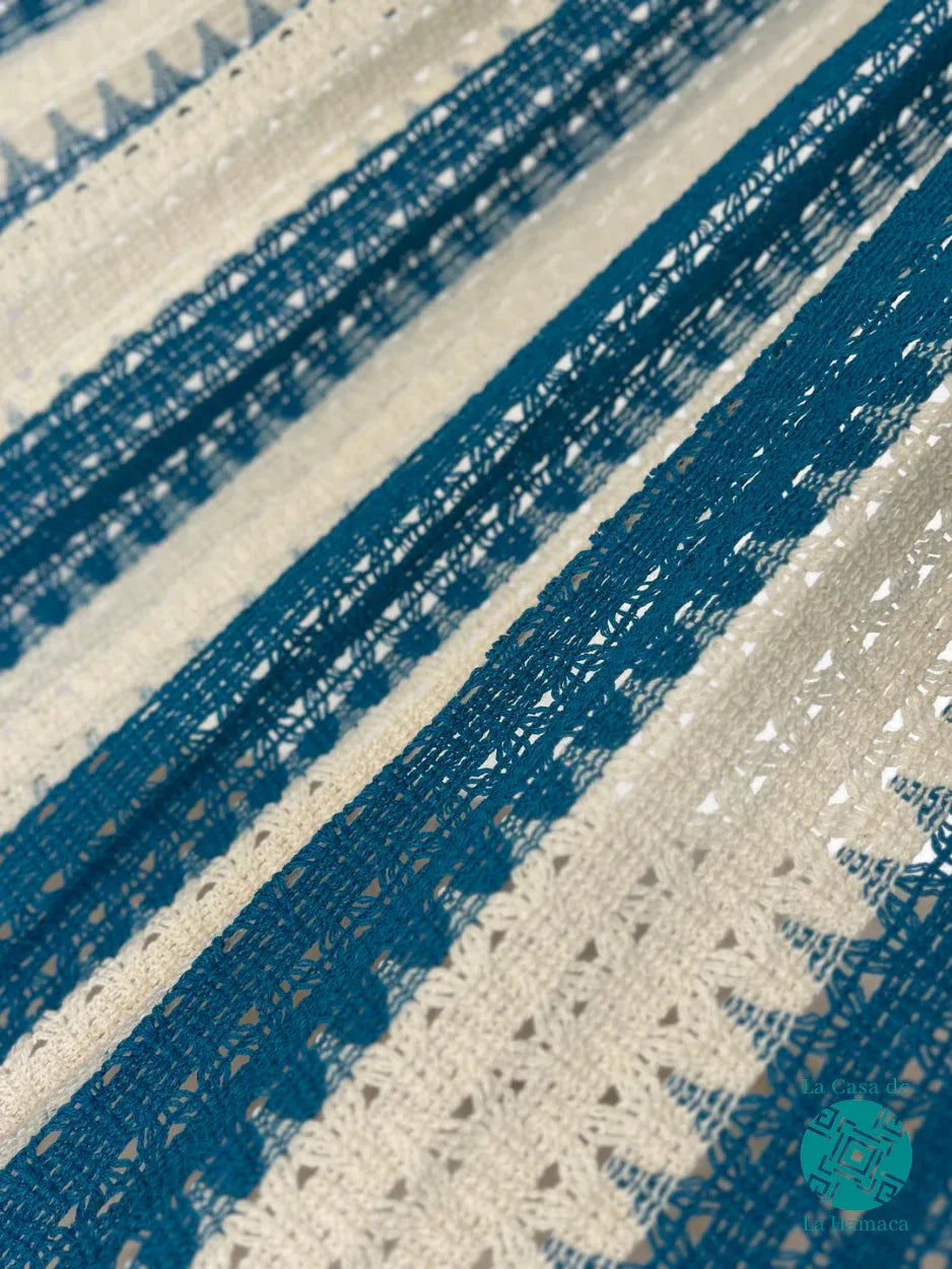Detalle del tejido de hamaca mexicana azul turquesa de algodón