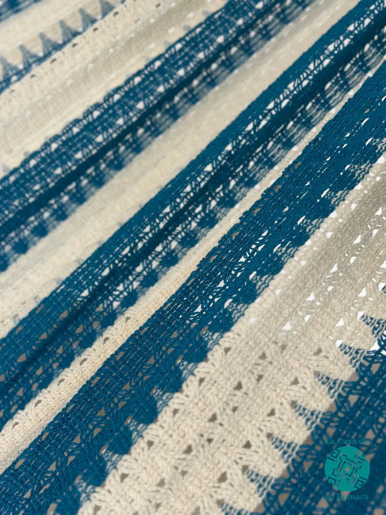 Detalle del tejido de hamaca mexicana azul turquesa de algodón