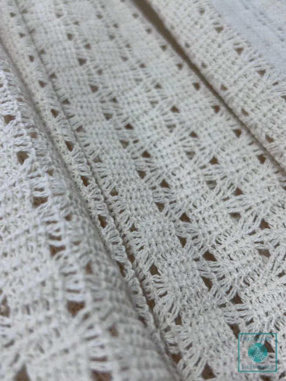 Detalle del tejido de hamaca mexicana infantil beige de algodón